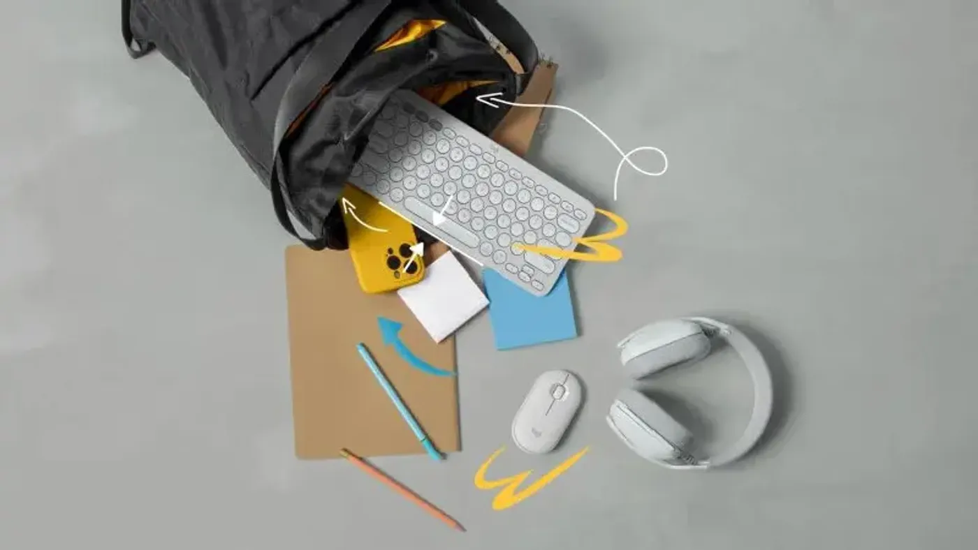 The portable Logitech Pebble Keys 2 K380s shown in a lifestyle environment